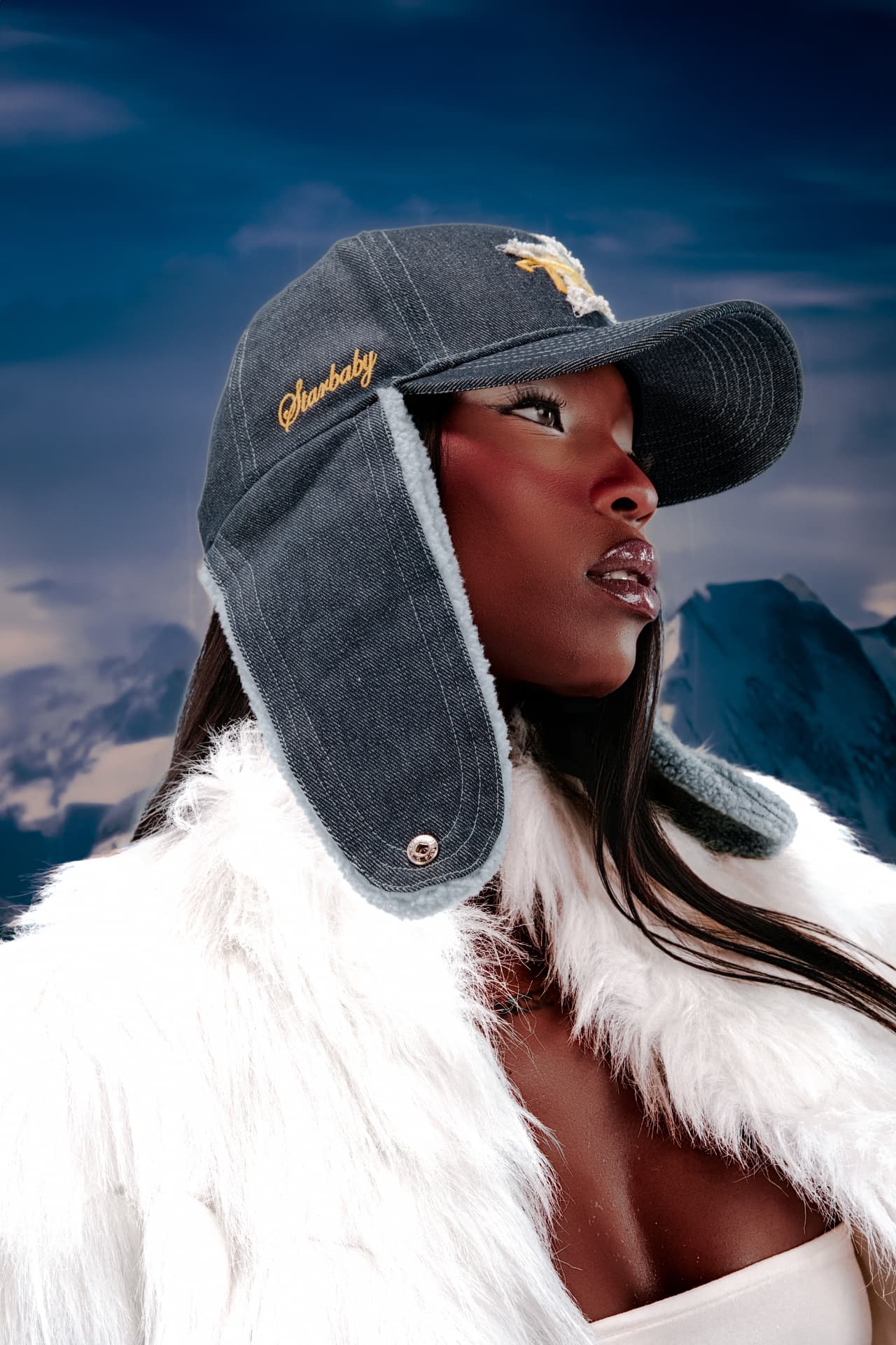 Tit4Tat — close profile in denim trapper cap