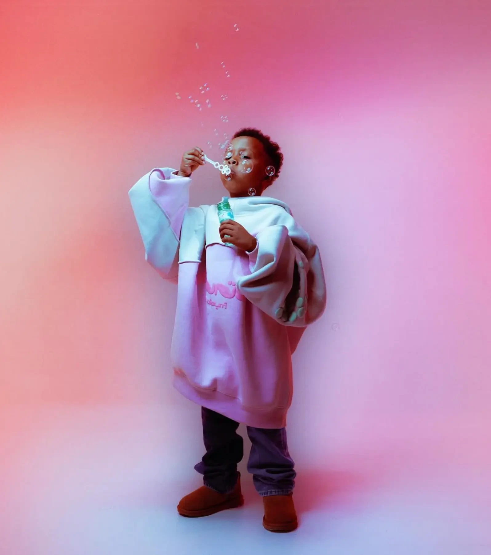 Huni Look Book — child blowing bubbles