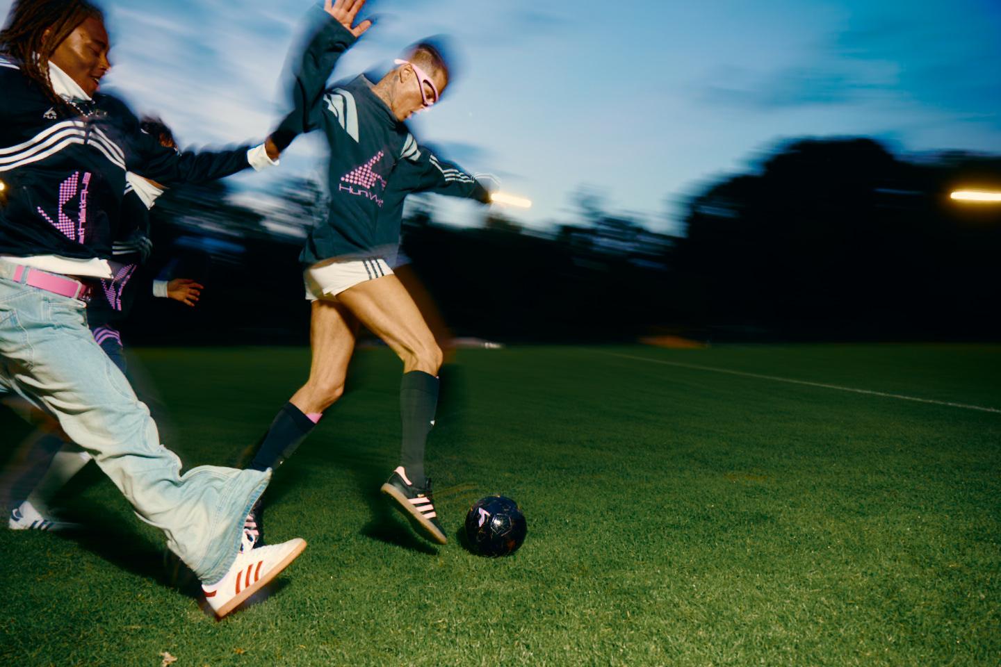 Adidas X Huni — footballers contesting the ball