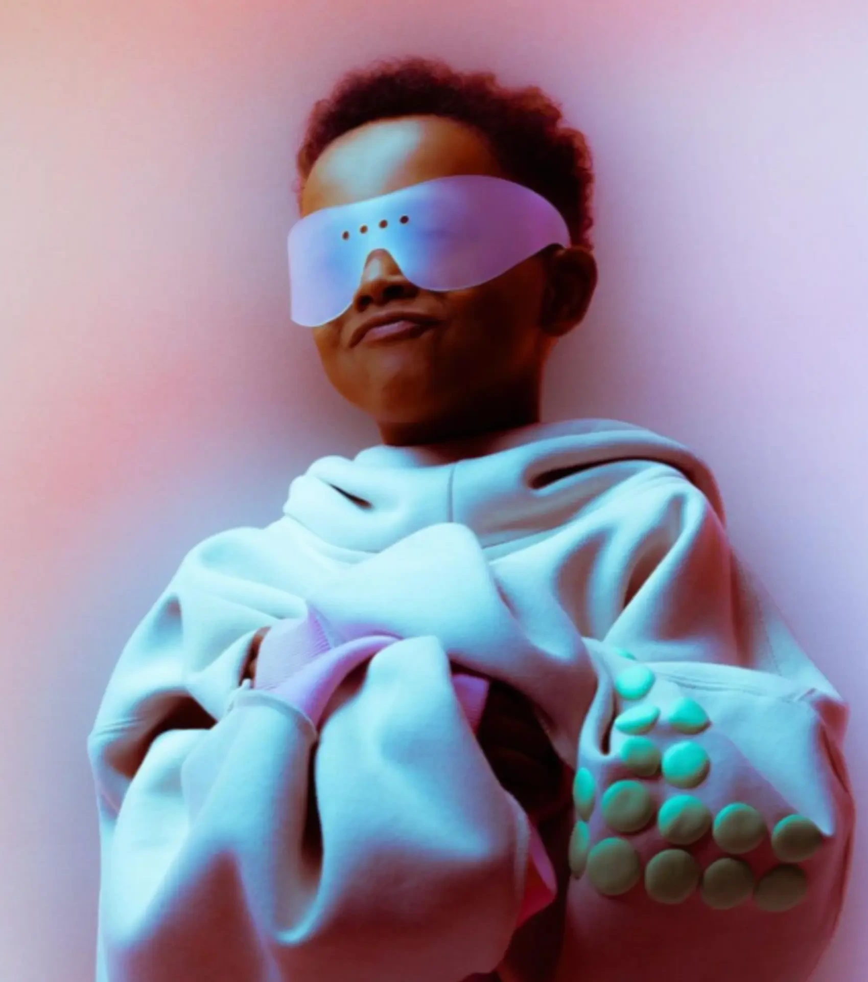 Huni Look Book — child in sculptural hoodie and visor