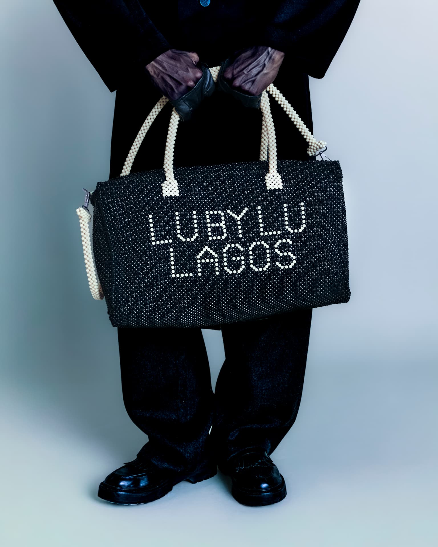 Detail of the beaded LU BY LU Lagos holdall