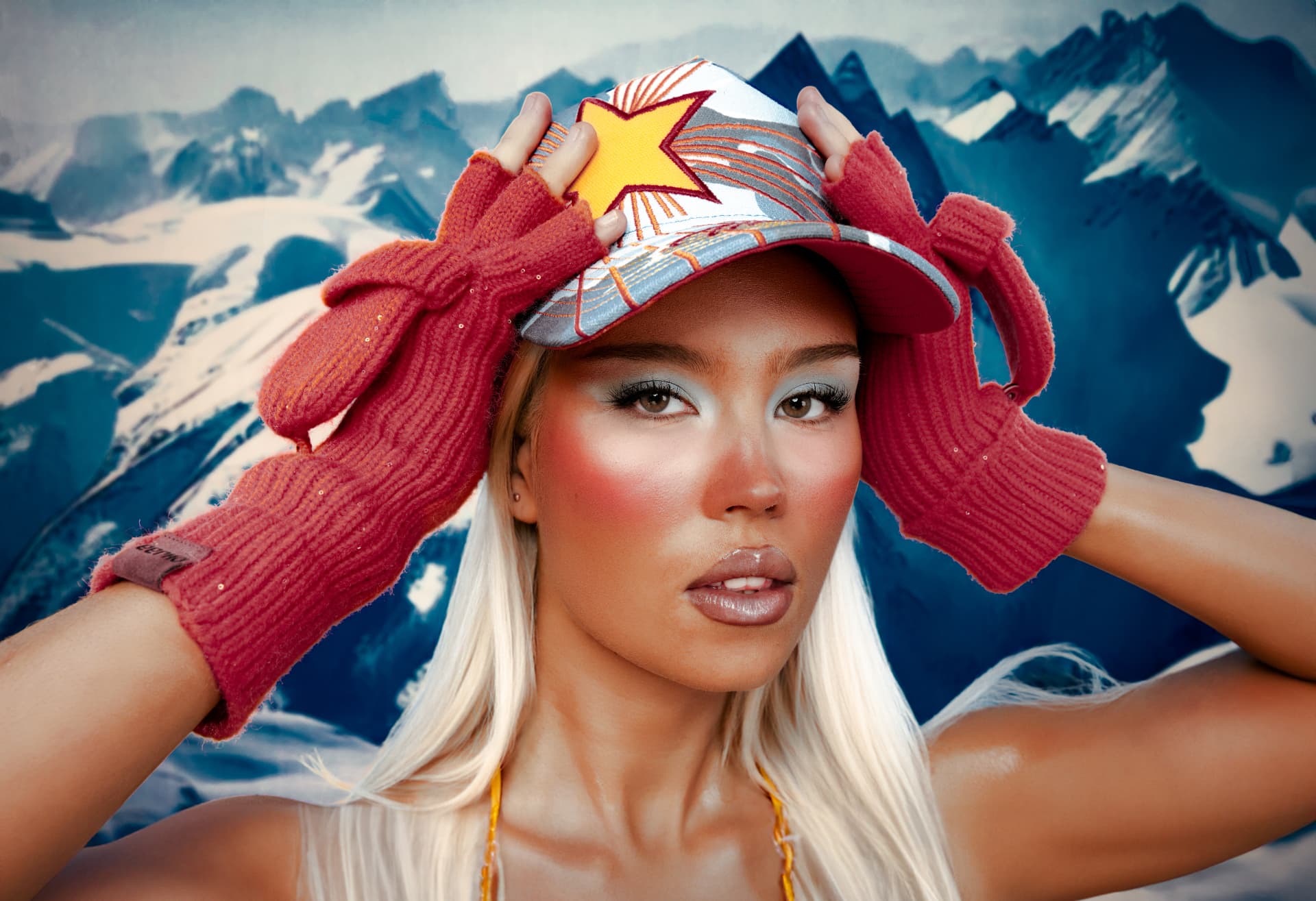 Tit4Tat — close portrait in star cap and red gloves