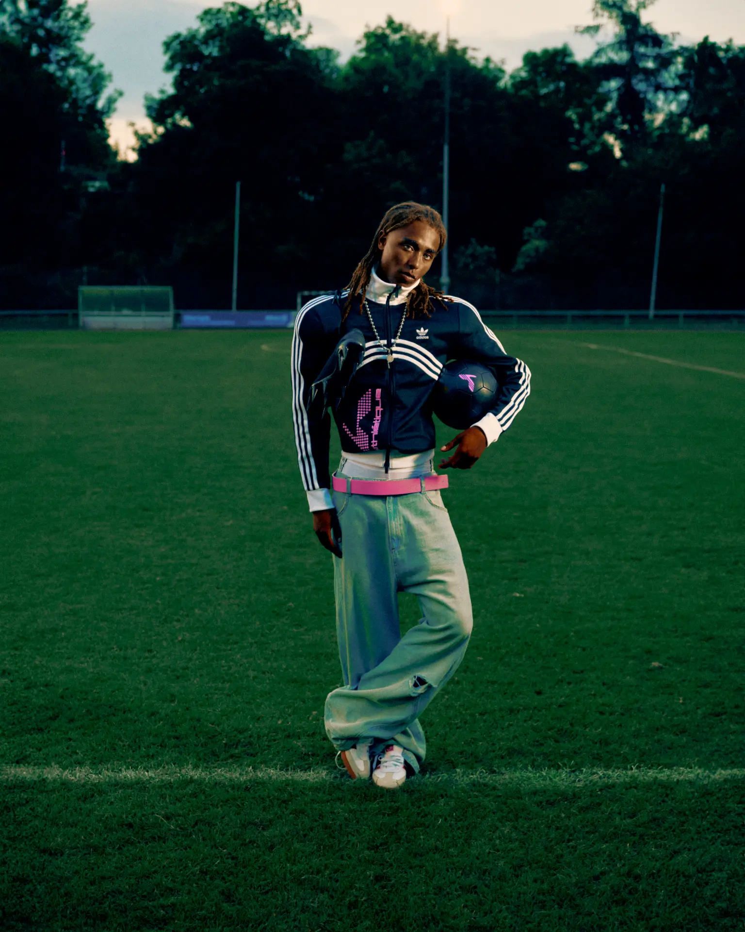 Adidas X Huni — footballer standing on the pitch