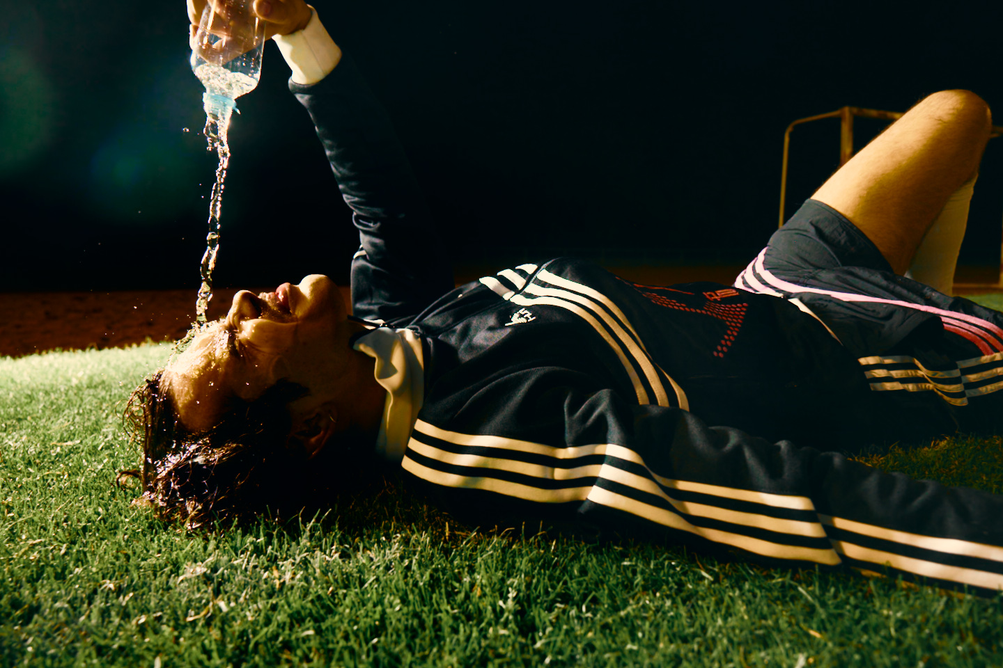 Adidas X Huni — footballer cooling down on the pitch